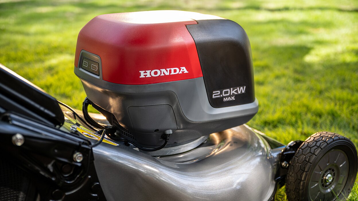 Close up of the three quart back right of the battery lawn mower battery compartment.